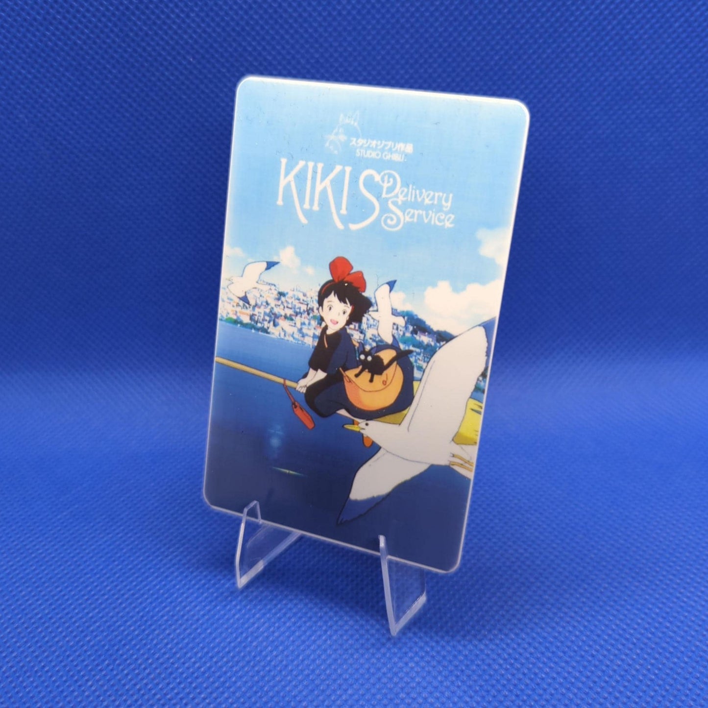 Card with 'Kiki's Delivery Service' design on a blue background